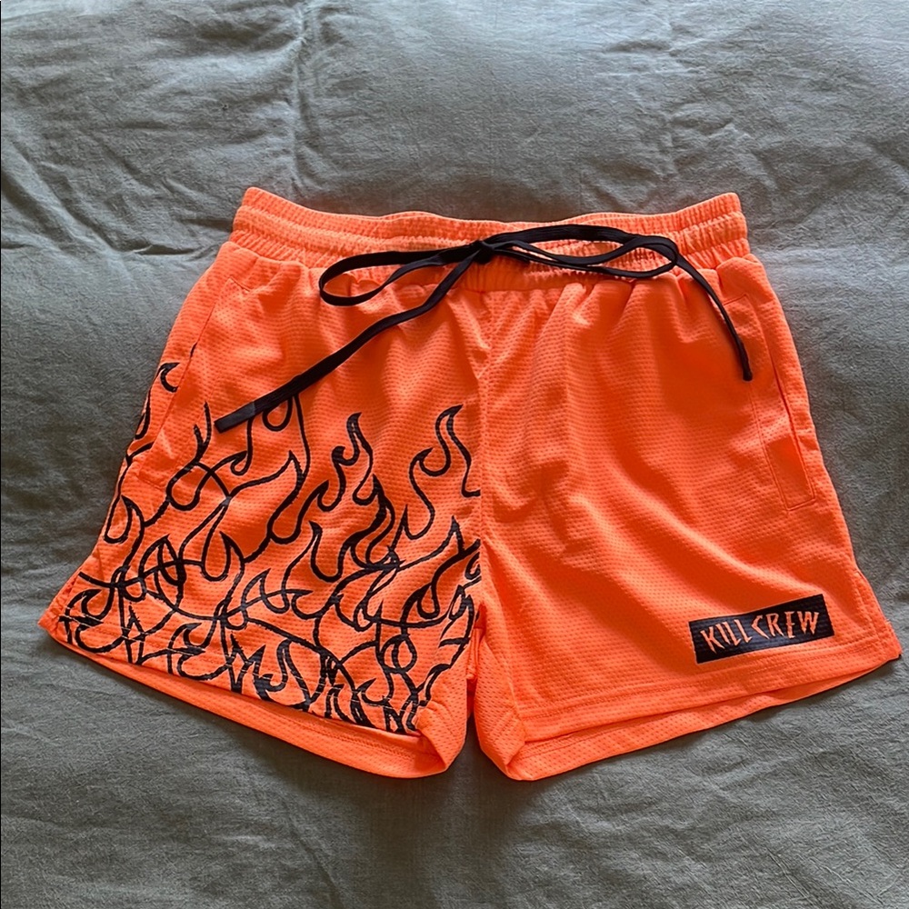 Kill Crew Orange Shorts with Black Flame Design